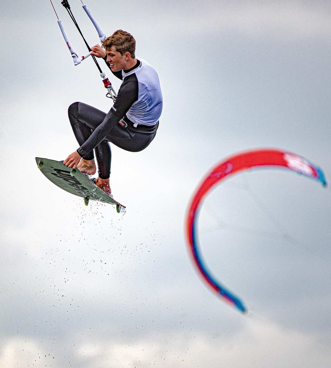 kitesurfing, flying, surfer, kite surfer, kiteboarding, sports, water sports, athletic, adventure, leisure, recreation, activity